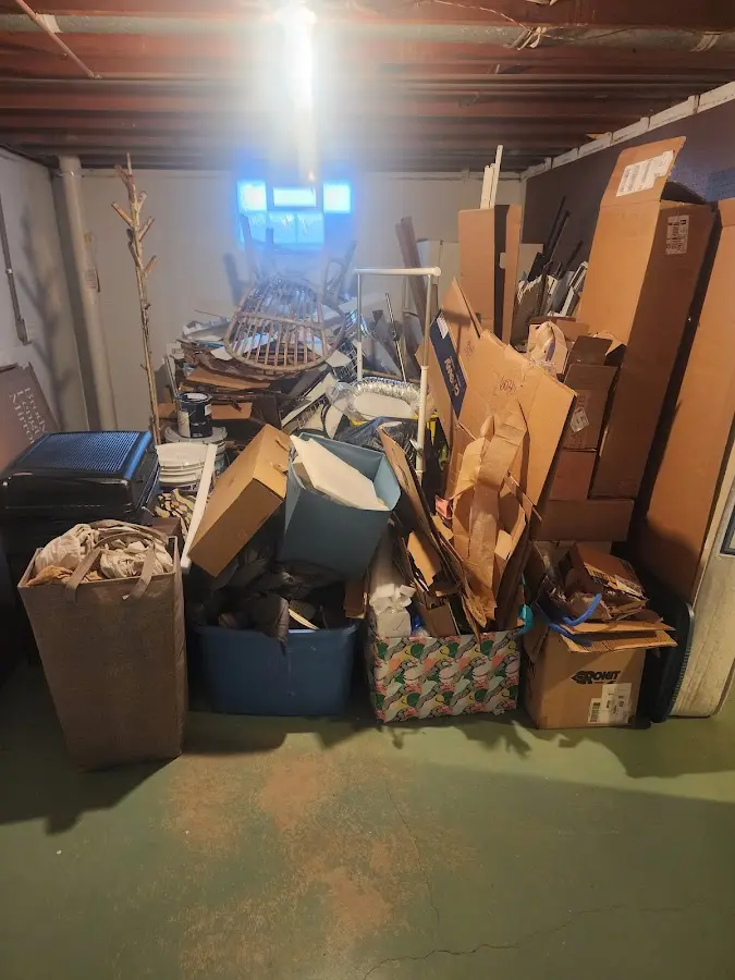 Roll-off dumpster container at job site for Cleanout Dumpster Rental in Gray